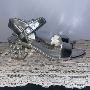 Silver leather Dune London sandals with glass jeweled block heels.